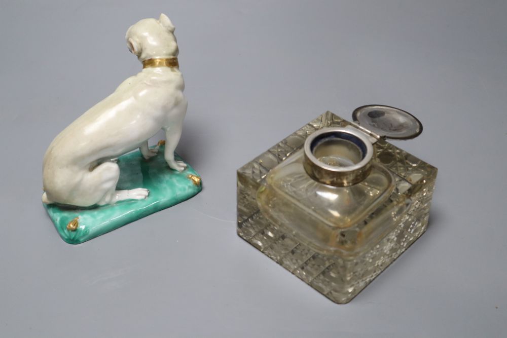 A Continental porcelain model of a mastiff and a silver-mounted glass inkwell